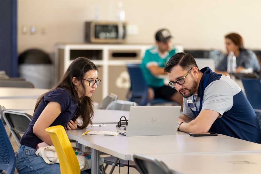 Counselor meeting with a Lemoore College student