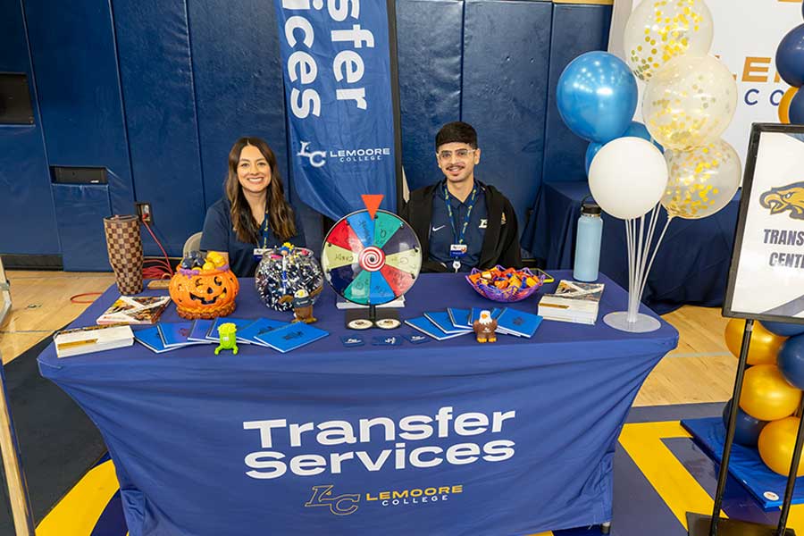 Student receiving assistance at the Transfer Kiosk